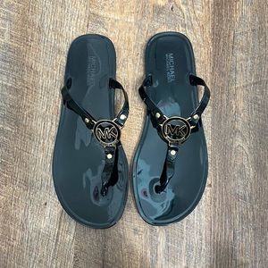 Micheal Kors flip flops